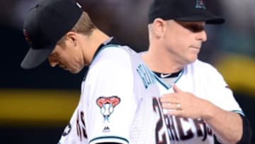 May 17, 2016; Phoenix, AZ, USA; Arizona Diamondbacks manager Chip Hale (3) takes Arizona Diamondbacks starting pitcher Zack Greinke (21) out of the game during the eighth inning against the New York Yankees at Chase Field. Mandatory Credit: Joe Camporeale-USA TODAY Sports