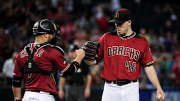 Aug 28, 2016; Phoenix, AZ, USA; Arizona Diamondbacks starting pitcher Patrick Corbin (46) celebrates with catcher Welington Castillo (7) after beating the Cincinnati Reds 11-2 at Chase Field. Mandatory Credit: Matt Kartozian-USA TODAY Sports