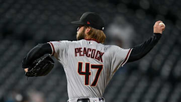 DENVER, CO - APRIL 6: Matt Peacock #47 of the Arizona Diamondbacks pitches against the Colorado Rockies at Coors Field on April 6, 2021 in Denver, Colorado. (Photo by Dustin Bradford/Getty Images)