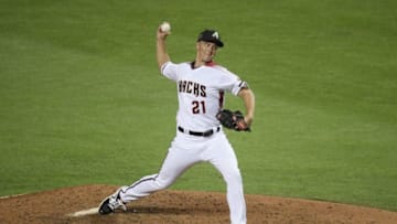 Zack Greinke is now 7-0 in July with a 0.93 ERA. (Rob Carr / Getty Images)