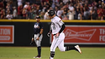 With his first major league homer Tuesday night, Taijuan Walker contributed with his bat. (Norm Hall - Getty Images)