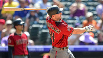 DENVER, CO - JUNE 10: Paul Goldschmidt #44 of the Arizona Diamondbacks hits an RBI triple in the seventh inning of a game against the Colorado Rockies at Coors Field on June 10, 2018 in Denver, Colorado. (Photo by Dustin Bradford/Getty Images)