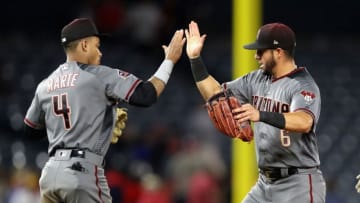 ANAHEIM, CA - JUNE 18: Ketel Marte #4 of the Arizona Diamondbacks congratulates David Peralta #6 of the Arizona Diamondbacks after defeating the Los Angeles Angels of Anaheim 7-4 in a game at Angel Stadium on June 18, 2018 in Anaheim, California. (Photo by Sean M. Haffey/Getty Images)