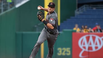 PITTSBURGH, PA - JUNE 23: Nick Ahmed #13 of the Arizona Diamondbacks throws to first base for a force out of Jose Osuna #36 of the Pittsburgh Pirates in the eighth inning during the game at PNC Park on June 23, 2018 in Pittsburgh, Pennsylvania. (Photo by Justin Berl/Getty Images)