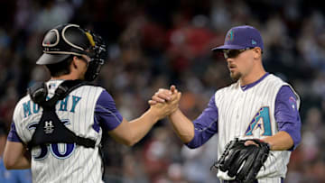 PHOENIX, AZ - SEPTEMBER 14: John Ryan Murphy #36 and Braden Shipley #34 of the Arizona Diamondbacks celebrate after closing ou the MLB game against the Colorado Rockies at Chase Field on September 14, 2017 in Phoenix, Arizona. (Photo by Jennifer Stewart/Getty Images)