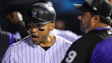 DENVER, CO - SEPTEMBER 16: Carlos Gonzalez #5 of the Colorado Rockies celebrates in the dugout after hitting a fifth inning two-run homerun against the San Diego Padres at Coors Field on September 16, 2017 in Denver, Colorado. (Photo by Dustin Bradford/Getty Images)