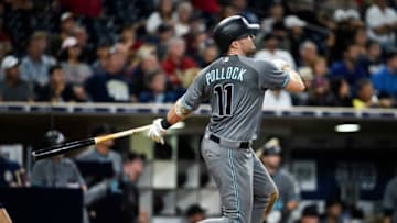 SAN DIEGO, CA - SEPTEMBER 19: A.J. Pollock #11 of the Arizona Diamondbacks hits a solo home run during the sixth inning of a baseball game against the San Diego Padres at PETCO Park on September 19, 2017 in San Diego, California. (Photo by Denis Poroy/Getty Images)