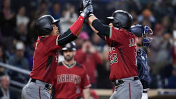 SAN DIEGO, CA - SEPTEMBER 20: J.D. Martinez #28 of the Arizona Diamondbacks, right, is congratulated by Ketel Marte #4 after hitting a two-run home during the sixth inning of a baseball game against the San Diego Padres at PETCO Park on September 20, 2017 in San Diego, California. (Photo by Denis Poroy/Getty Images)