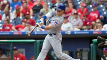 Sep 13, 2015; Philadelphia, PA, USA; Chicago Cubs left fielder Chris Coghlan (8) hits a triple during the first inning against the Philadelphia Phillies at Citizens Bank Park. Mandatory Credit: Bill Streicher-USA TODAY Sports