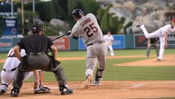 Apr 29, 2014; Anaheim, CA, USA; Los Angeles Angels starting pitcher Jered Weaver (36) strikes out Cleveland Indians designated hitter Jason Giambi (25) in the second inning of game at Angel Stadium of Anaheim. Mandatory Credit: Jayne Kamin-Oncea-USA TODAY Sports