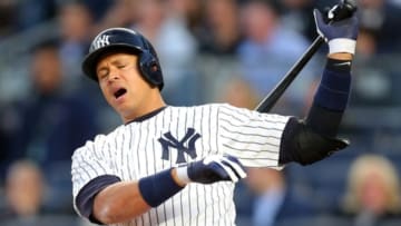 Apr 20, 2016; Bronx, NY, USA; New York Yankees designated hitter Alex Rodriguez (13) reacts after swinging and missing for strike two during the first inning against the Oakland Athletics at Yankee Stadium. Rodriguez would strike out with the bases loaded to end the first inning. Mandatory Credit: Brad Penner-USA TODAY Sports