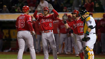 Apr 12, 2016; Oakland, CA, USA; Los Angeles Angels left fielder Craig Gentry (3) waits to high five catcher Geovany Soto (18) after being batted in on Soto