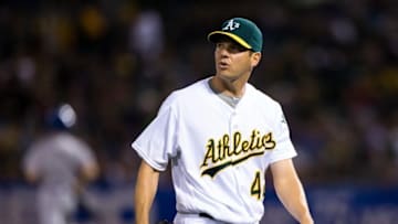 Apr 15, 2016; Oakland, CA, USA; Oakland Athletics starting pitcher Rich Hill (18) walks off the field after throwing against the Kansas City Royals in the third inning at O.co Coliseum. Mandatory Credit: John Hefti-USA TODAY Sports