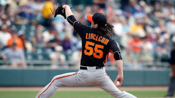 Mar 3, 2015; Mesa, AZ, USA; San Francisco Giants starting pitcher Tim Lincecum (55) throws in the third inning against the Oakland Athletics at HoHoKam Stadium. Mandatory Credit: Rick Scuteri-USA TODAY Sports