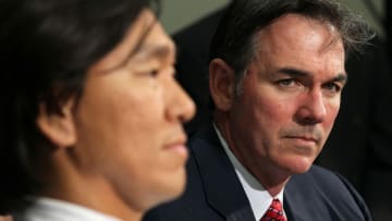 OAKLAND, CA - DECEMBER 14: Oakland Athletics general manager Billy Beane (R) looks on as Hideki Matsui (L) speaks during a press conference where he was introduced as the newest member of the Oakland Athletics at Oakland-Alameda County Coliseum on December 14, 2010 in Oakland, California. The Oakland Athletics signed designated hitter Hideki Matsui to a one-year deal worth $4.25 million plus possible incentives for the 2011 season. (Photo by Justin Sullivan/Getty Images)
