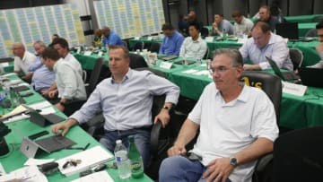 OAKLAND, CA - JUNE 3: General Manager David Forst and Executive Vice President of Baseball Operations Billy Beane of the Oakland Athletics sit in the Athletics draft room, during the opening day of the 2019 MLB draft, at the Oakland-Alameda County Coliseum on June 3, 2019 in Oakland, California. (Photo by Michael Zagaris/Oakland Athletics/Getty Images)