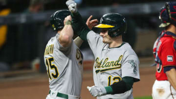 MINNEAPOLIS, MN - MAY 14: Seth Brown #15 celebrates with Sean Murphy #12 of the Oakland Athletics after Murphy hit a two-run home run against the Minnesota Twins in the fifth inning of the game at Target Field on May 14, 2021 in Minneapolis, Minnesota. The Athletics defeated the Twins 6-1. (Photo by David Berding/Getty Images)