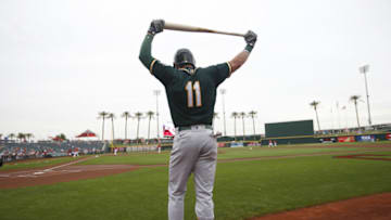 GOODYEAR, AZ - February 28: Dustin Fowler #11 of the Oakland Athletics stands in the on-deck circle prior to the game against the Cincinnati Reds at Goodyear Ballpark on February 28, 2020 in Goodyear, Arizona. (Photo by Michael Zagaris/Oakland Athletics/Getty Images)