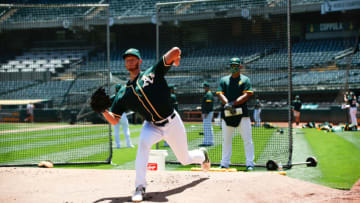 OAKLAND, CA - JULY 8: A.J. Puk #31 of the Oakland Athletics throws in the bullpen during summer workouts at RingCentral Coliseum on July 8, 2020 in Oakland, California. (Photo by Michael Zagaris/Oakland Athletics/Getty Images)