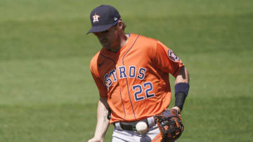 OAKLAND, CALIFORNIA - AUGUST 08: Josh Reddick #22 of the Houston Astros chases after a foul ball off the bat of Matt Chapman #26 of the Oakland Athletics in the bottom of the six inning at RingCentral Coliseum on August 08, 2020 in Oakland, California. (Photo by Thearon W. Henderson/Getty Images)