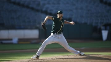 OAKLAND, CA - JULY 13: A.J. Puk #31 of the Oakland Athletics pitches during summer workouts at RingCentral Coliseum on July 13, 2020 in Oakland, California. (Photo by Michael Zagaris/Oakland Athletics/Getty Images)
