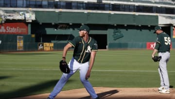 OAKLAND, CA - JULY 18: A.J. Puk #31 of the Oakland Athletics throws in the bullpen during summer workouts at RingCentral Coliseum on July 18, 2020 in Oakland, California. (Photo by Michael Zagaris/Oakland Athletics/Getty Images)