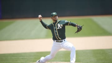 OAKLAND, CA - JULY 19: James Kaprielian #56 of the Oakland Athletics pitches during summer workouts at RingCentral Coliseum on July 19, 2020 in Oakland, California. (Photo by Michael Zagaris/Oakland Athletics/Getty Images)