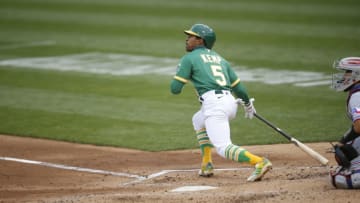 OAKLAND, CA - AUGUST 5: Tony Kemp #5 of the Oakland Athletics bats during the game against the Texas Rangers at RingCentral Coliseum on August 5, 2020 in Oakland, California. The Athletics defeated the Rangers 6-4. (Photo by Michael Zagaris/Oakland Athletics/Getty Images)