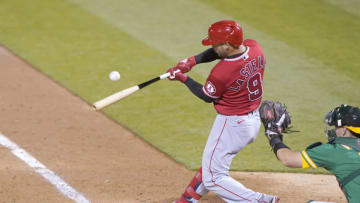 OAKLAND, CALIFORNIA - AUGUST 21: Tommy La Stella #9 of the Los Angeles Angels bats against the Oakland Athletics in the top of the six inning at RingCentral Coliseum on August 21, 2020 in Oakland, California. (Photo by Thearon W. Henderson/Getty Images)
