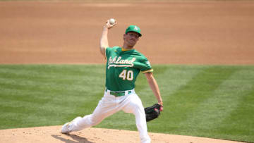 OAKLAND, CALIFORNIA - AUGUST 22: Chris Bassitt #40 of the Oakland Athletics pitches against the Los Angeles Angels in the first inning at RingCentral Coliseum on August 22, 2020 in Oakland, California. (Photo by Ezra Shaw/Getty Images)