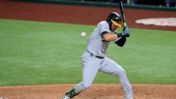 ARLINGTON, TEXAS - AUGUST 26: Robbie Grossman #8 of the Oakland Athletics is hit by a pitch thrown by Jonathan Hernandez #72 of the Texas Rangers in the top of the eighth inning at Globe Life Field on August 26, 2020 in Arlington, Texas. (Photo by Tom Pennington/Getty Images)