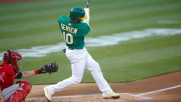 OAKLAND, CA - AUGUST 21: Marcus Semien #10 of the Oakland Athletics hits a home run during the game against the Los Angeles Angels at RingCentral Coliseum on August 21, 2020 in Oakland, California. The Athletics defeated the Angels 5-3. (Photo by Michael Zagaris/Oakland Athletics/Getty Images)
