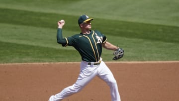 OAKLAND, CALIFORNIA - SEPTEMBER 05: Matt Chapman #26 of the Oakland Athletics throws to first base to throw out Jorge Mateo #3 of the San Diego Padres in the top of the second inning at RingCentral Coliseum on September 05, 2020 in Oakland, California. (Photo by Thearon W. Henderson/Getty Images)