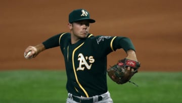 ARLINGTON, TEXAS - SEPTEMBER 12: Daulton Jefferies #66 of the Oakland Athletics throws in his major league debut against the Texas Rangers in the first inning at Globe Life Field on September 12, 2020 in Arlington, Texas. (Photo by Ronald Martinez/Getty Images)