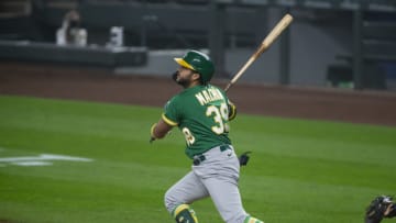 SEATTLE, WA - SEPTEMBER 14: Vimael Machin #39 of the Oakland Athletics follows through on a single during the third inning against the Seattle Mariners in the second game of a doubleheader at T-Mobile Park on September 14, 2020 in Seattle, Washington. The Oakland Athletics beat the Seattle Mariners 9-0. (Photo by Lindsey Wasson/Getty Images)