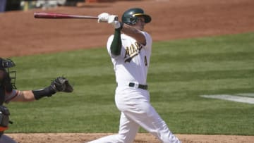 OAKLAND, CALIFORNIA - SEPTEMBER 19: Jake Lamb #4 of the Oakland Athletics bats against the San Francisco Giants in the bottom of the fifth inning at RingCentral Coliseum on September 19, 2020 in Oakland, California. (Photo by Thearon W. Henderson/Getty Images)