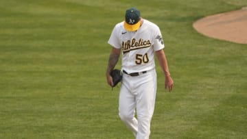OAKLAND, CALIFORNIA - OCTOBER 01: Mike Fiers #50 of the Oakland Athletics walks back to the dugout after he was taken out of the game against the Chicago White Sox during the second inning of Game Three of the American League Wild Card Round at RingCentral Coliseum on October 01, 2020 in Oakland, California. (Photo by Thearon W. Henderson/Getty Images)