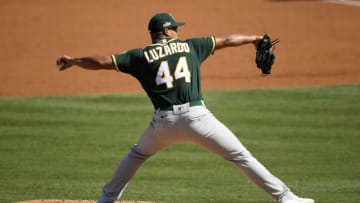 LOS ANGELES, CALIFORNIA - OCTOBER 07: Jesus Luzardo #44 of the Oakland Athletics throws against the Houston Astros in Game Three of the American League Division Series at Dodger Stadium on October 07, 2020 in Los Angeles, California. (Photo by Kevork Djansezian/Getty Images)