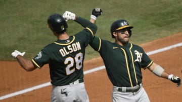 LOS ANGELES, CALIFORNIA - OCTOBER 08: Ramon Laureano #22 of the Oakland Athletics celebrates a three run home run against the Houston Astros with teammate Matt Olson #28 during the second inning in Game Four of the American League Division Series at Dodger Stadium on October 08, 2020 in Los Angeles, California. (Photo by Kevork Djansezian/Getty Images)