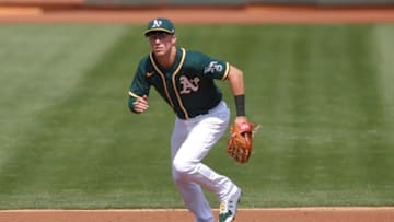 OAKLAND, CA - SEPTEMBER 20: Jake Lamb #4 of the Oakland Athletics fields during the game against the San Francisco Giants at RingCentral Coliseum on September 20, 2020 in Oakland, California. The Giants defeated the Athletics 14-2. (Photo by Michael Zagaris/Oakland Athletics/Getty Images)