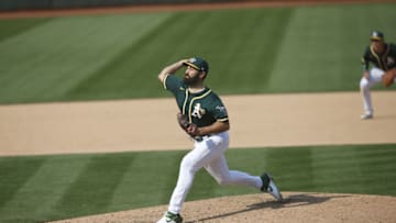 OAKLAND, CA - SEPTEMBER 20: Lou Trivino #62 of the Oakland Athletics pitches during the game against the San Francisco Giants at RingCentral Coliseum on September 20, 2020 in Oakland, California. The Giants defeated the Athletics 14-2. (Photo by Michael Zagaris/Oakland Athletics/Getty Images)