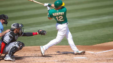 OAKLAND, CA - SEPTEMBER 30: Sean Murphy #12 of the Oakland Athletics bats during the game against the Chicago White Sox at RingCentral Coliseum on September 30, 2020 in Oakland, California. The Athletics defeated the White Sox 5-3. (Photo by Michael Zagaris/Oakland Athletics/Getty Images)