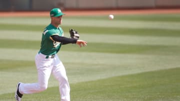 OAKLAND, CA - SEPTEMBER 30: Tommy La Stella #3 of the Oakland Athletics fields during the game against the Chicago White Sox at RingCentral Coliseum on September 30, 2020 in Oakland, California. The Athletics defeated the White Sox 5-3. (Photo by Michael Zagaris/Oakland Athletics/Getty Images)