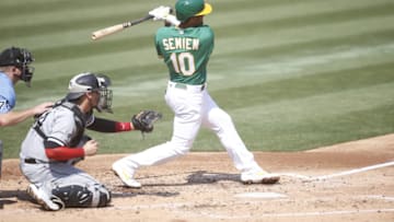 OAKLAND, CA - SEPTEMBER 30: Marcus Semien #10 of the Oakland Athletics hits a home run during the game against the Chicago White Sox at RingCentral Coliseum on September 30, 2020 in Oakland, California. The Athletics defeated the White Sox 5-3. (Photo by Michael Zagaris/Oakland Athletics/Getty Images)