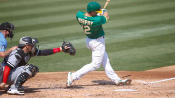 OAKLAND, CA - SEPTEMBER 30: Sean Murphy #12 of the Oakland Athletics bats during the game against the Chicago White Sox at RingCentral Coliseum on September 30, 2020 in Oakland, California. The Athletics defeated the White Sox 5-3. (Photo by Michael Zagaris/Oakland Athletics/Getty Images)