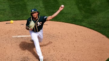 OAKLAND, CALIFORNIA - APRIL 04: Sean Manaea #55 of the Oakland Athletics pitches against the Houston Astros at RingCentral Coliseum on April 04, 2021 in Oakland, California. (Photo by Daniel Shirey/Getty Images)