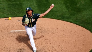 OAKLAND, CALIFORNIA - APRIL 04: Sean Manaea #55 of the Oakland Athletics pitches against the Houston Astros at RingCentral Coliseum on April 04, 2021 in Oakland, California. (Photo by Daniel Shirey/Getty Images)