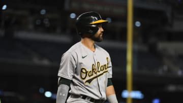 PHOENIX, ARIZONA - APRIL 13: Ka'ai Tom #1 of the Oakland Athletics walks back to the dugout after an at bat against the Arizona Diamondbacks at Chase Field on April 13, 2021 in Phoenix, Arizona. (Photo by Norm Hall/Getty Images)