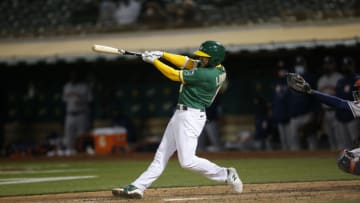 OAKLAND, CA - April 2: Jed Lowrie #8 of the Oakland Athletics bats during the game against the Houston Astros at RingCentral Coliseum on April 2, 2021 in Oakland, California. The Astros defeated the Athletics 9-5. (Photo by Michael Zagaris/Oakland Athletics/Getty Images)