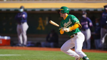 OAKLAND, CALIFORNIA - APRIL 21: Mark Canha #20 of the Oakland Athletics bats during the game against the Minnesota Twins at RingCentral Coliseum on April 21, 2021 in Oakland, California. (Photo by Daniel Shirey/Getty Images)